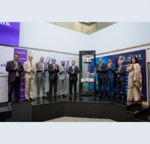 Am&atilde;na Bank Commemorates 15-Year Milestone by Ringing Market Opening Bell